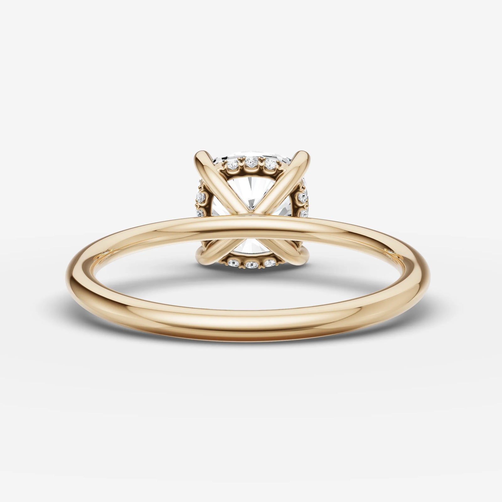 Mystere cushion diamond setting in gold, top view