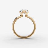 Demi pear diamond setting in gold, profile angle