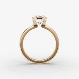 Demi oval diamond setting in gold, profile angle