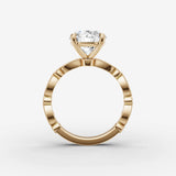 Heritage round diamond setting in gold, profile angle