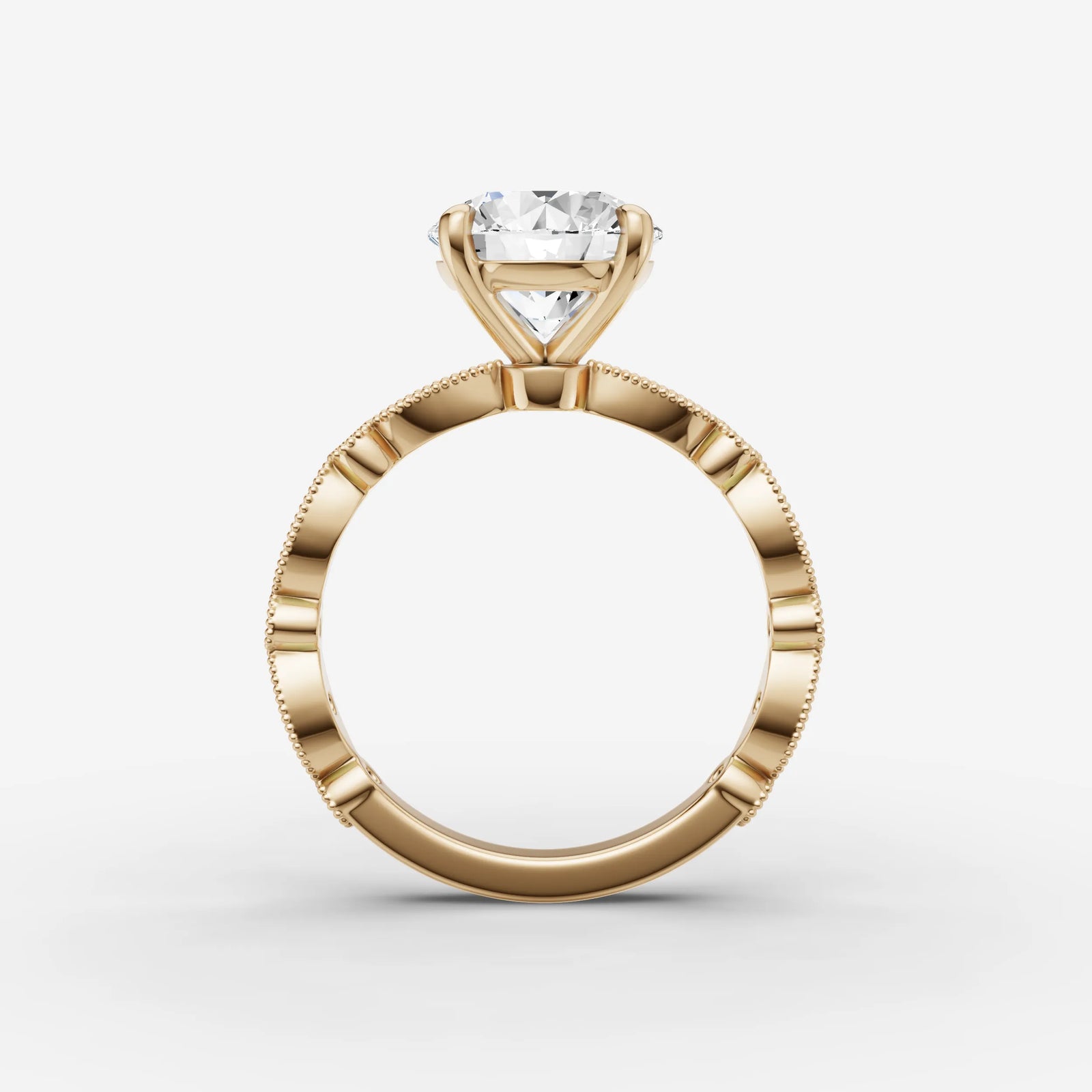 Heritage round diamond setting in gold, profile angle