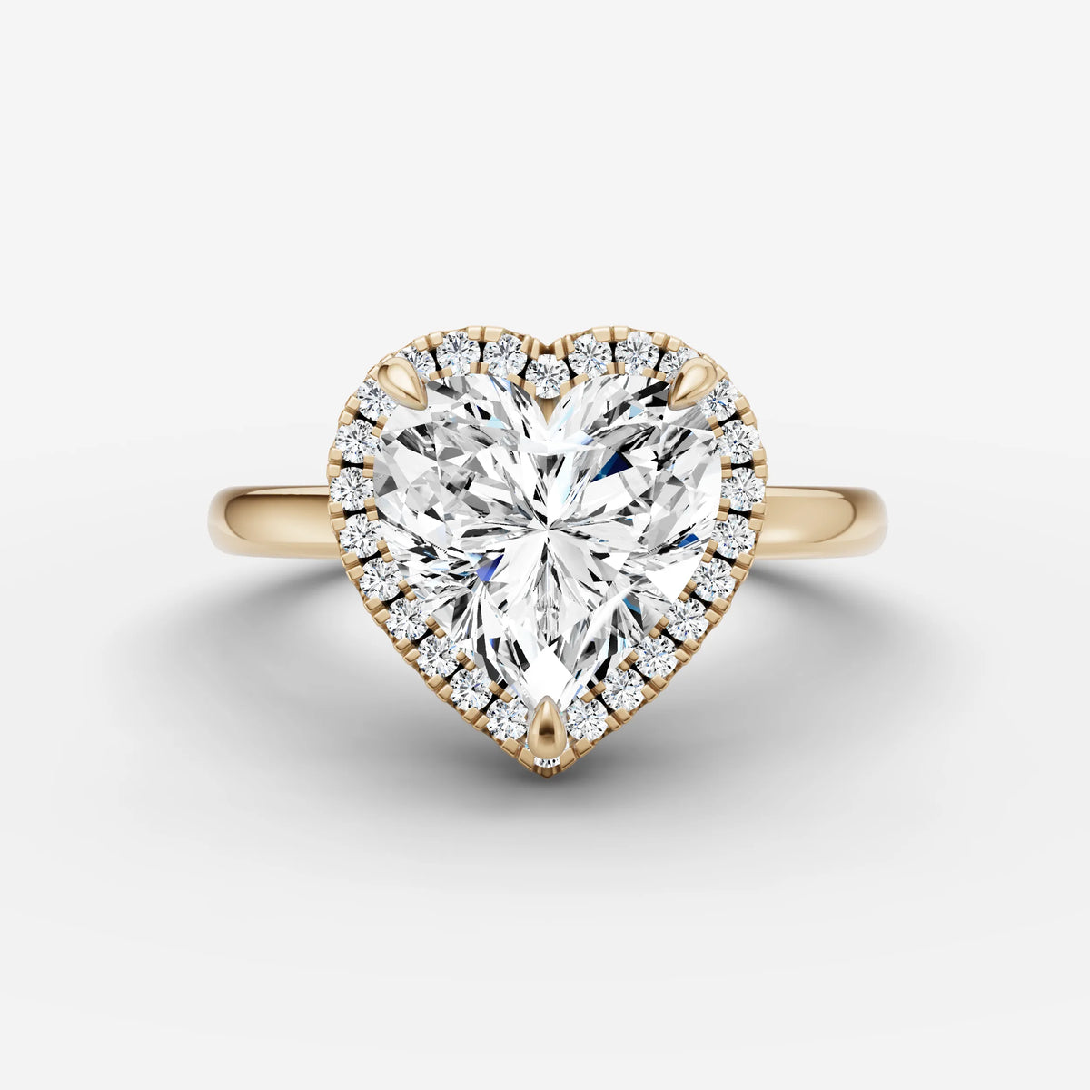 Aurore heart diamond setting in gold, front view