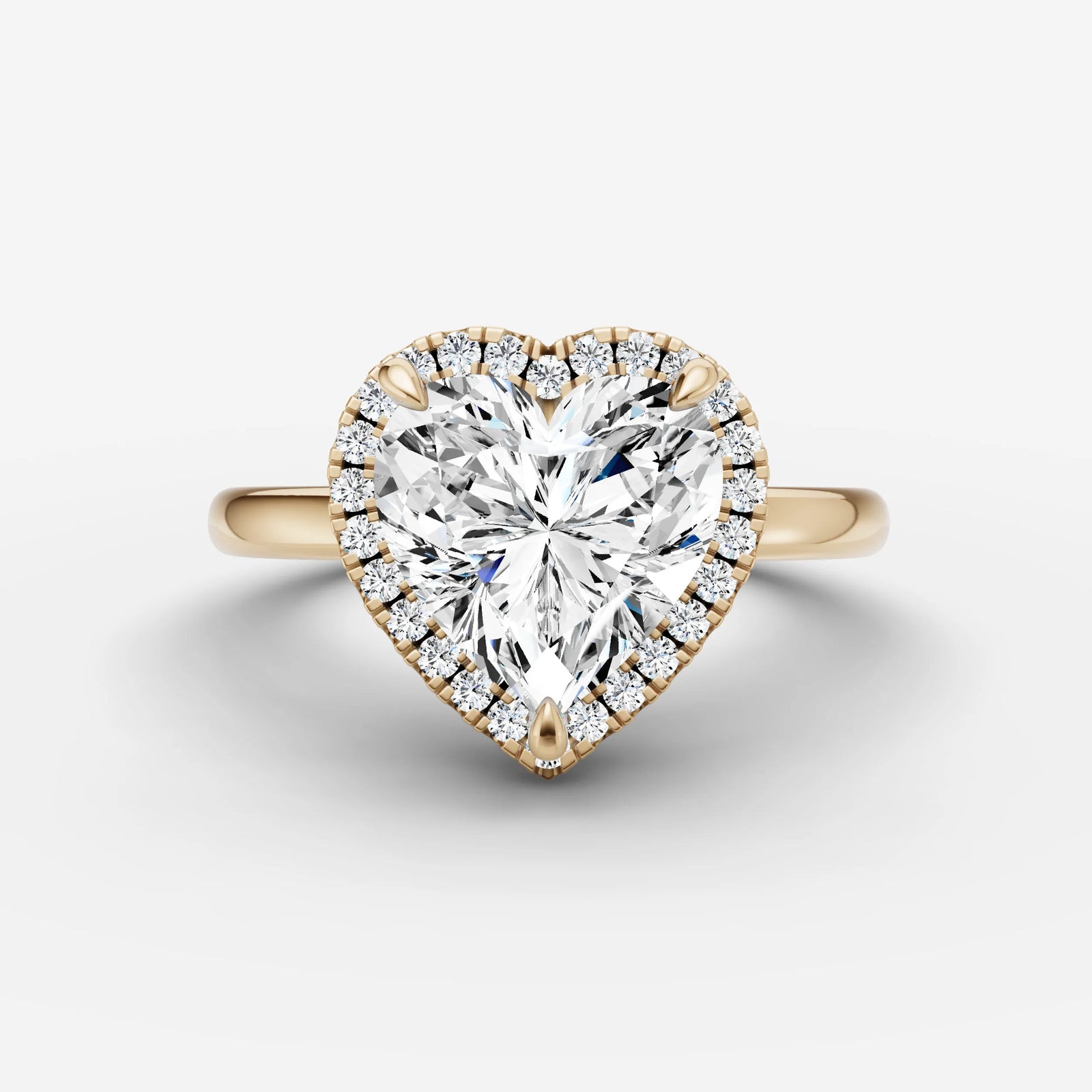 Aurore heart diamond setting in gold, front view