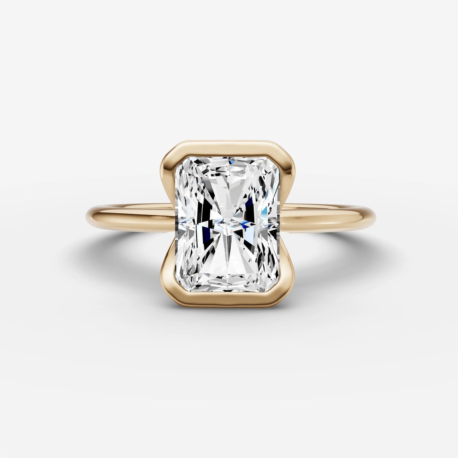 Demi radiant diamond setting in gold, front view