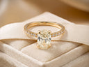 Soleil Pavé oval diamond engagement ring in 18k gold with artgold750 engraving