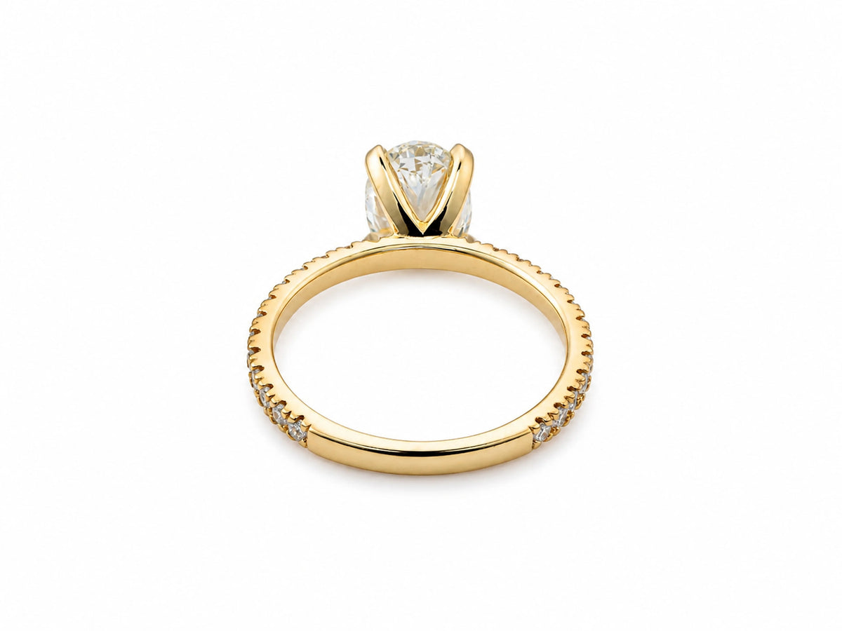Soleil pave oval yellow diamond engagement ring, close view on the hand