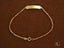 Solid 18k gold kids bracelet with box link style and engravable ID plate for personalized art gold jewelry