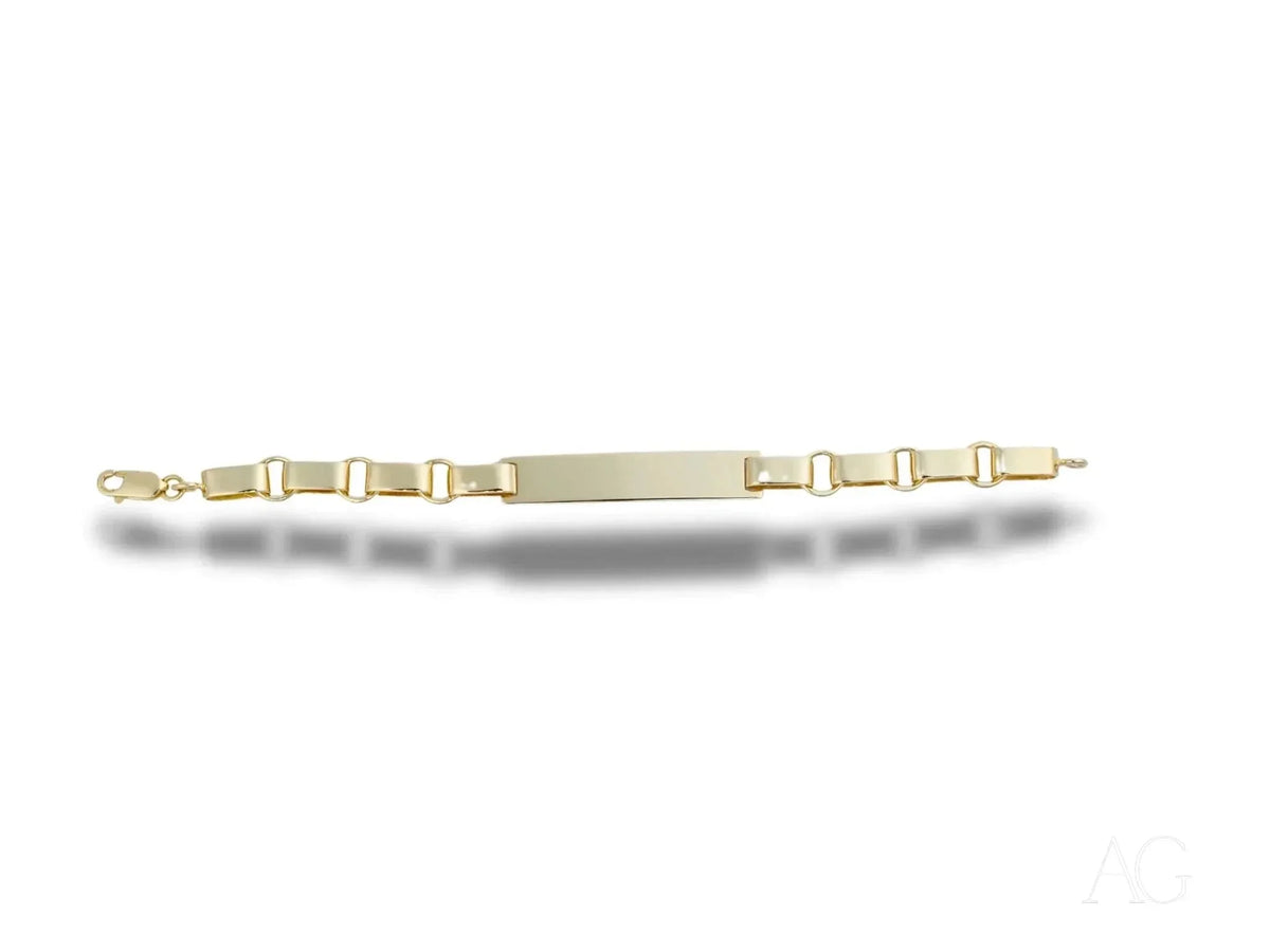 Solid 18k gold kid’s ID bracelet with unique chain links and gold flat plate