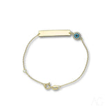 Solid gold kids ID bracelet with evil eye motif and customizable ID plate