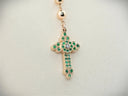 Solid gold rose gold cross pendant with emerald gemstones and diamond on chain