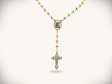 Solid gold rosary necklace with emerald and diamond cross medallion