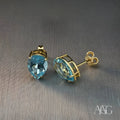Sophisticated Blue Topaz Gold Earrings