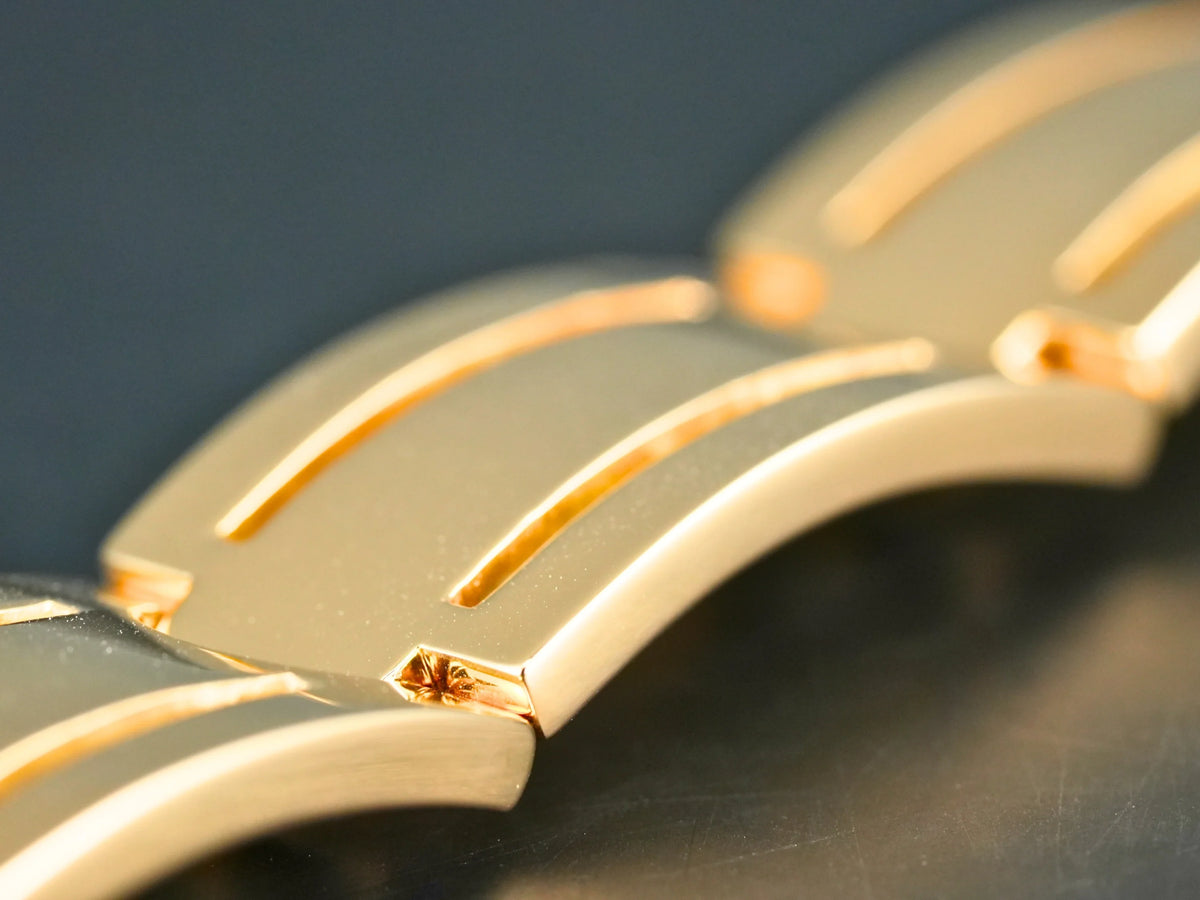Sovereign Bracelet: art gold signature solid gold watch bracelet with curved links and grooves
