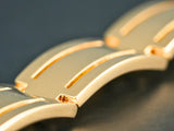Sovereign Bracelet: art gold signature solid gold watch bracelet with curved links and grooves