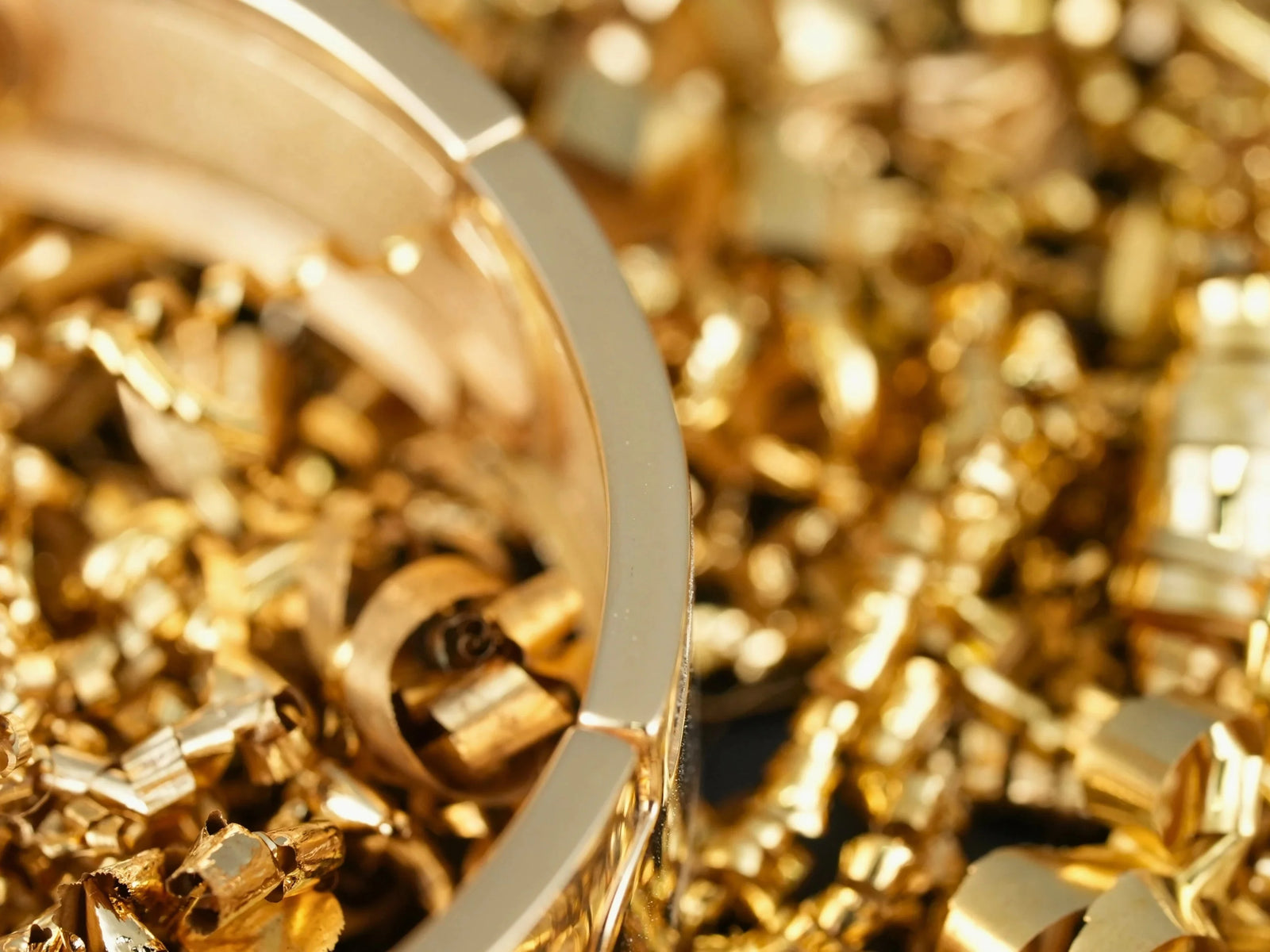 Sovereign Bracelet: solid gold bangle in art gold signature shavings
