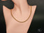 Bold 9mm 18k solid gold mariner chain necklace on mannequin