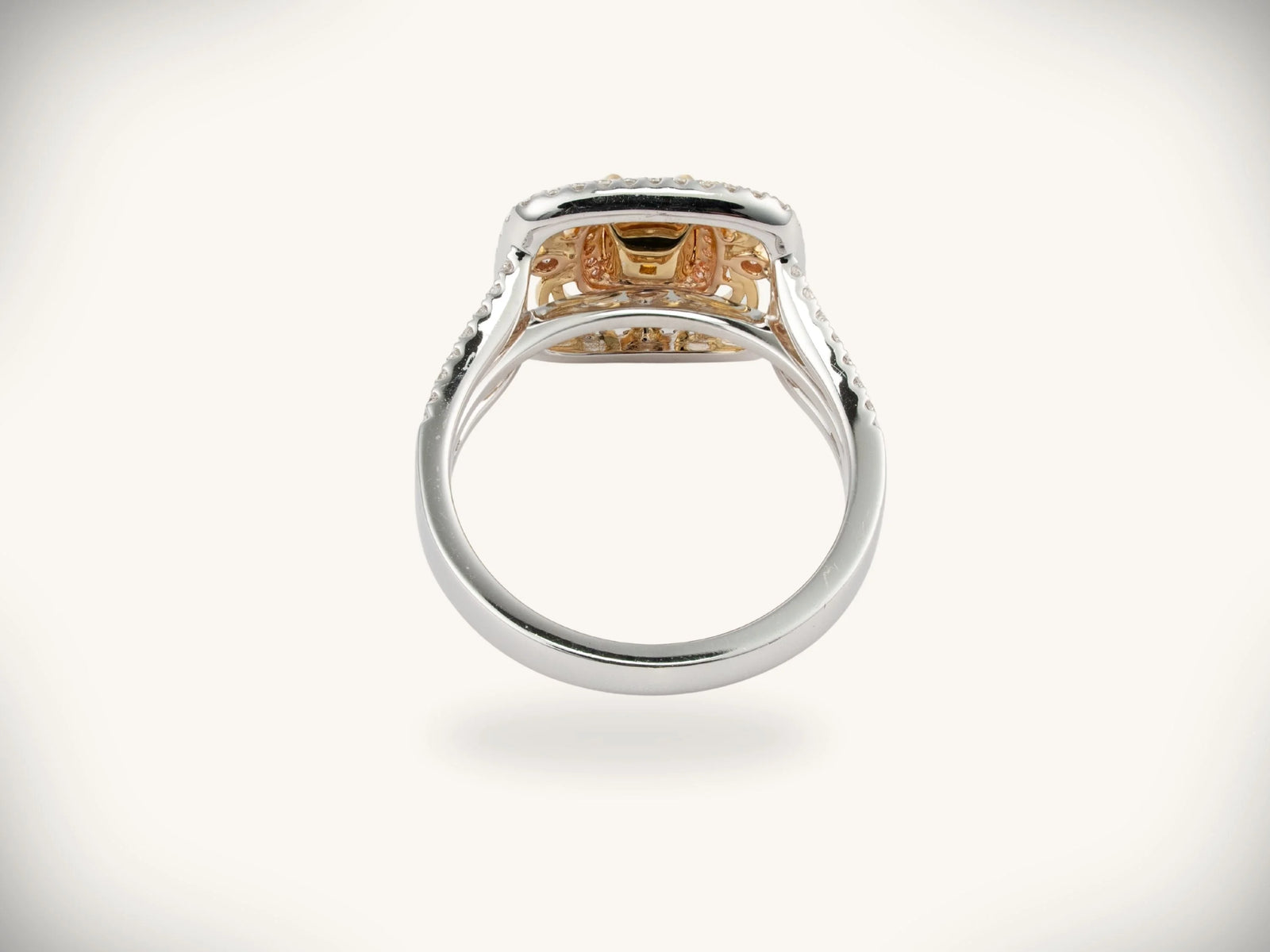 Sunburst halo two-tone gold jewelry with yellow diamond center