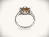 Sunset halo ring in silver-toned white gold with amber gem and diamonds