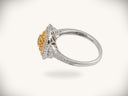 Sunset halo ring with yellow diamond cluster in white gold