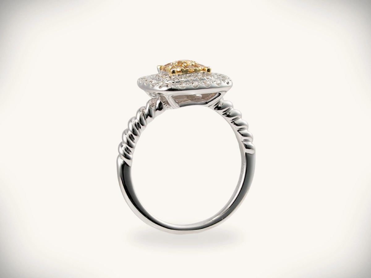 Sunshine Cushion Ring: elegant two-tone white gold with yellow diamond halo