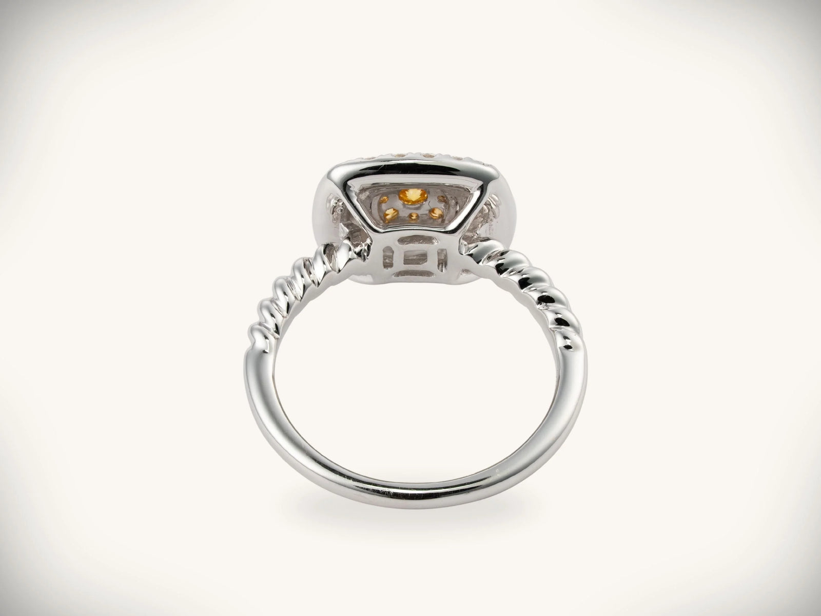 Sunshine cushion white gold ring with twisted band and yellow gemstone