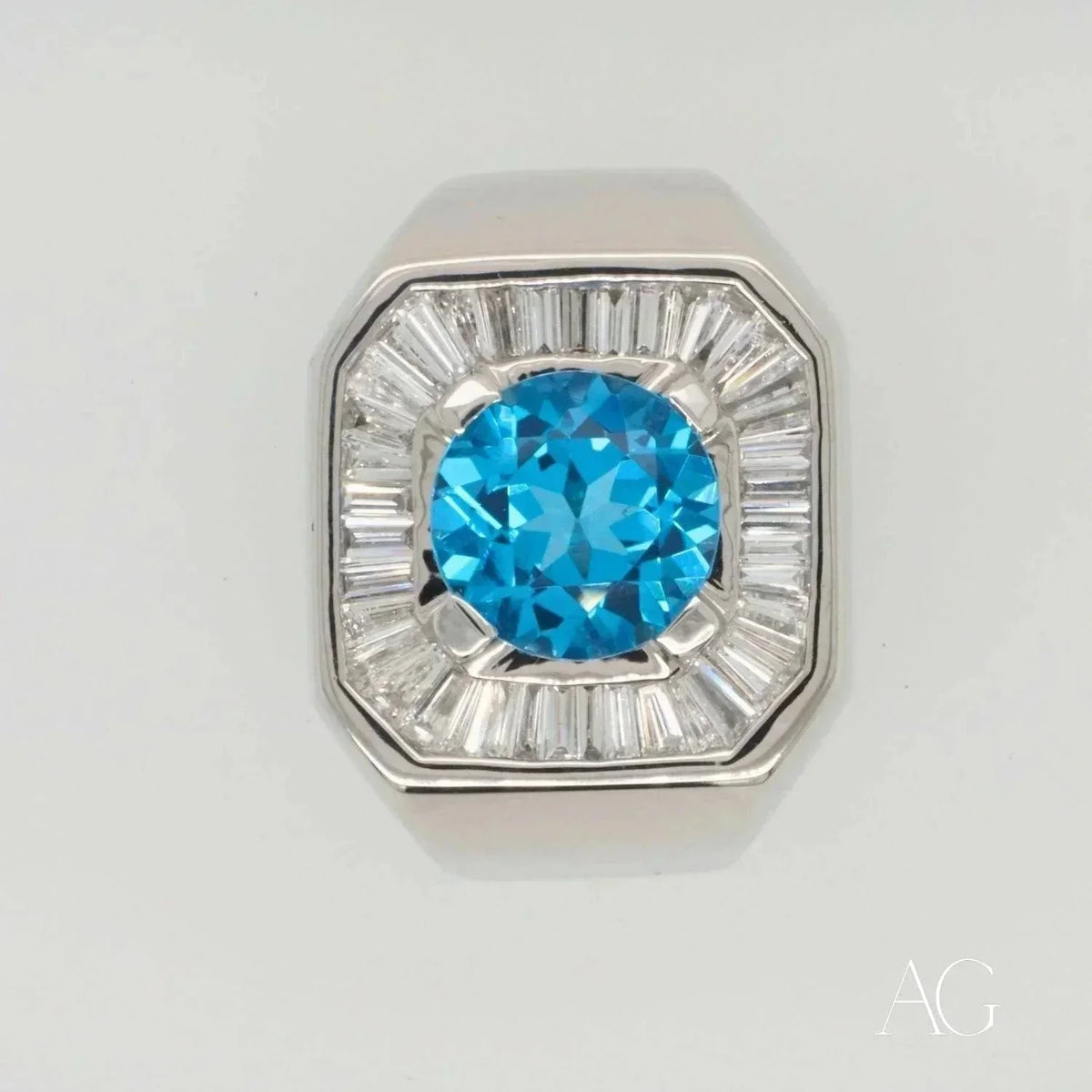Swiss Blue Topaz Elegance Ring with white gold and baguette diamonds