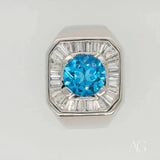 Swiss Blue Topaz Elegance Ring with white gold and baguette diamonds