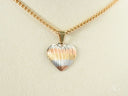 Three-tone heart pendant in art gold jewelry with tricolor striped texture
