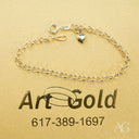 Timeless 18k gold heart bracelet with silver chain and lobster clasp