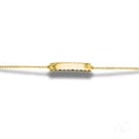 Gold-tone hammered metal bar pendant on customizable gold ID bracelet for kids