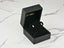 Black velvet jewelry box with Timeless Allure Earrings featuring 18K gold freshwater pearl stud earrings