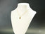 Gold necklace with faceted gemstone pendant showcasing timeless charm pendant in 18k solid gold