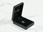 Black velvet jewelry box with a gold and diamond pendant from Timeless Charm Pendant collection