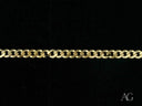 Polished 18k solid gold Cuban link bracelet with curb chain
