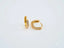 Gold hoop earrings with sparkling stones, part of art gold jewelry collection in 18k yellow gold