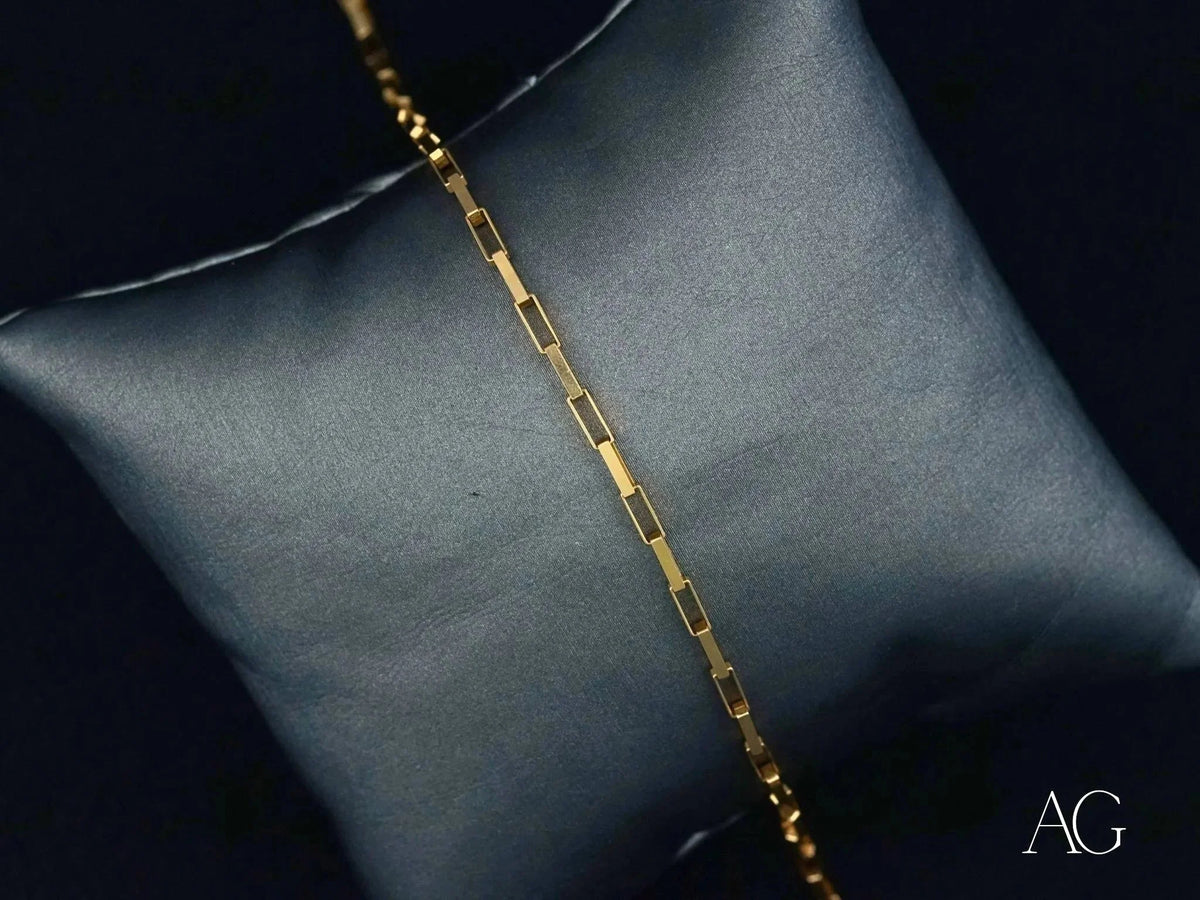 Thin solid 18k gold brick link bracelet with spring ring lock