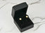 Art gold jewelry: gold stud earrings with white pearls in a black velvet box