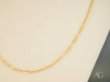 Timeless sophistication in solid 18k gold Figaro chain necklace
