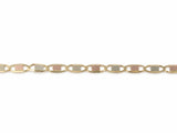 Piastrine chain laid flat, roughly ten yellow gold oval links with plates alternating white and rose gold, both ends cropped by the frame