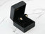Two-tone clover-shaped stud earrings in black velvet box from Trio Harmony 18k gold three-tone art gold jewelry