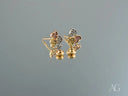 Trio Harmony 18k gold three-tone CZ stud earrings with heart gem clusters