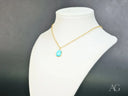 Turquoise Bloom 18k solid gold necklace with turquoise oval pendant
