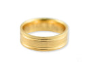 Twin Promise gold wedding band with brushed finish and polished grooves