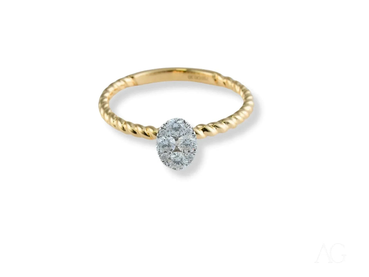 Twist of Brilliance Engagement Ring with twisted band and oval diamond focal point