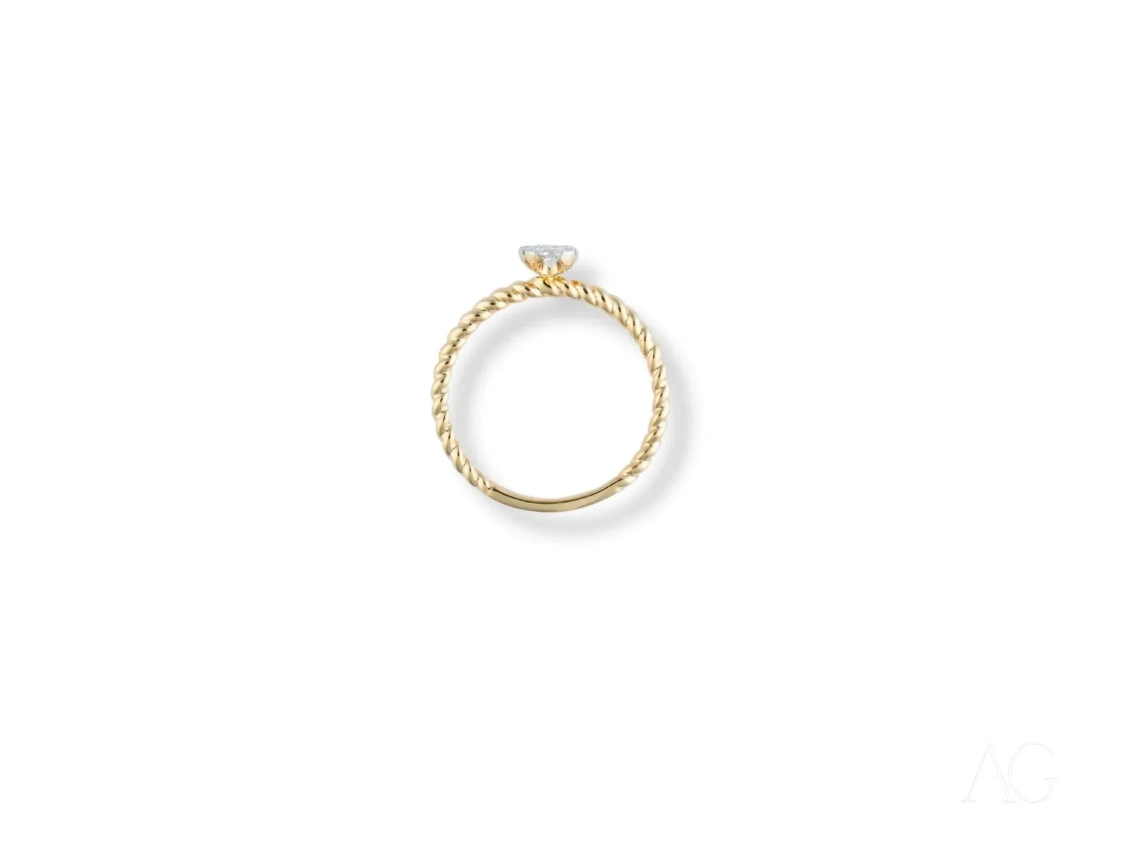 Twist of Brilliance engagement ring with twisted band and diamond focal point