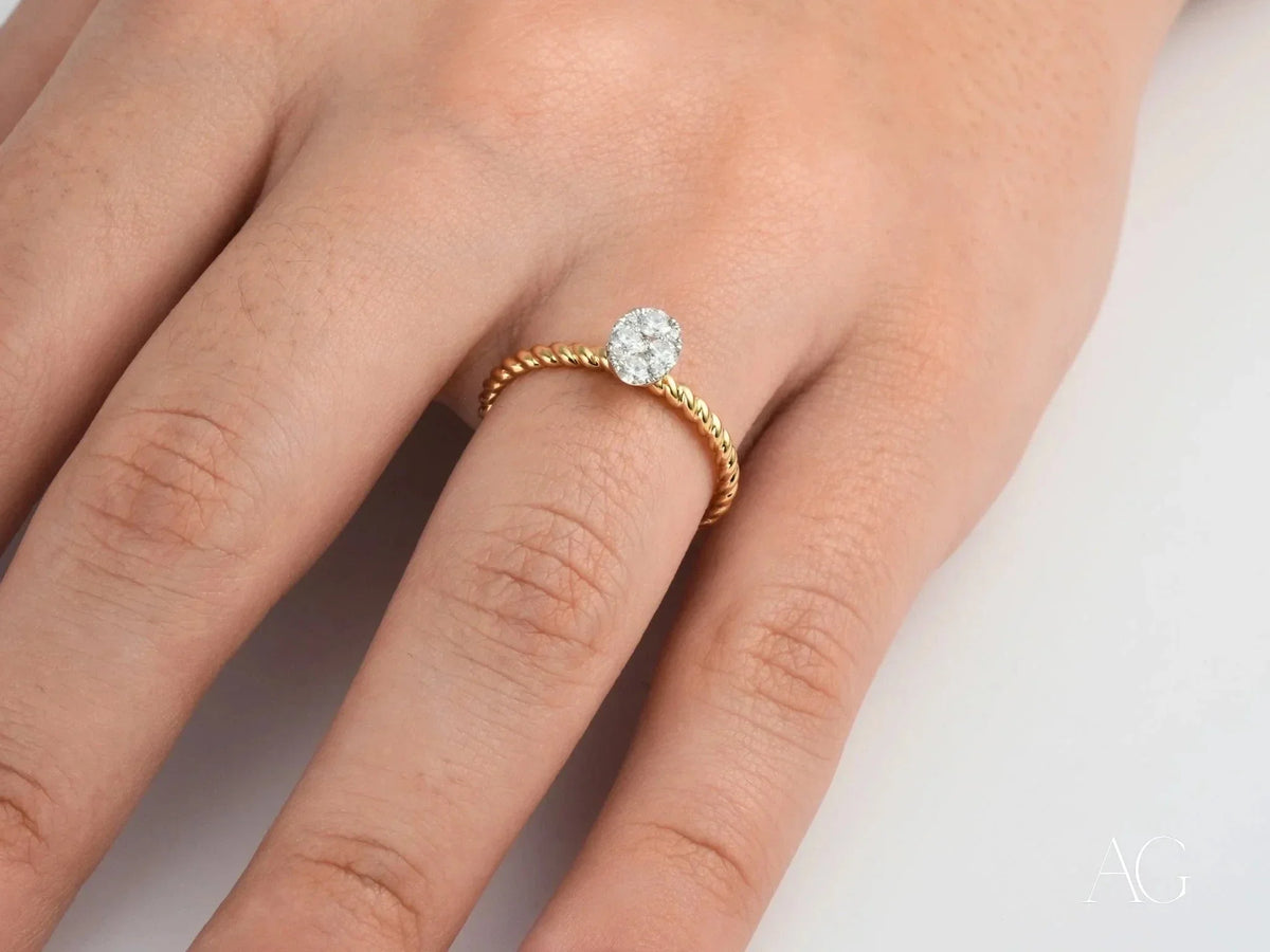 Twisted band gold ring with oval diamond focal point, Twist of Brilliance Engagement Ring