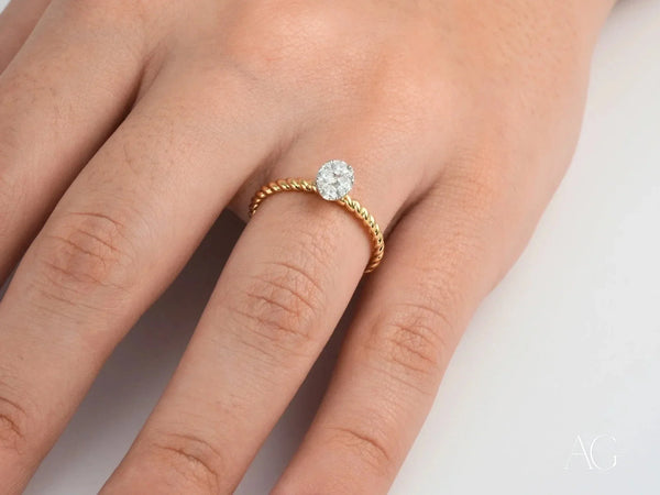 Twisted band gold ring with oval diamond focal point, Twist of Brilliance Engagement Ring