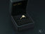 Gold Twist of Grace Engagement Ring with sparkling diamond in black jewelry box