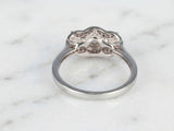 Underside gallery view of white gold three-stone diamond ring showing structure