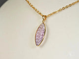 Violet Essence amethyst pendant in art gold jewelry with marquise purple gem